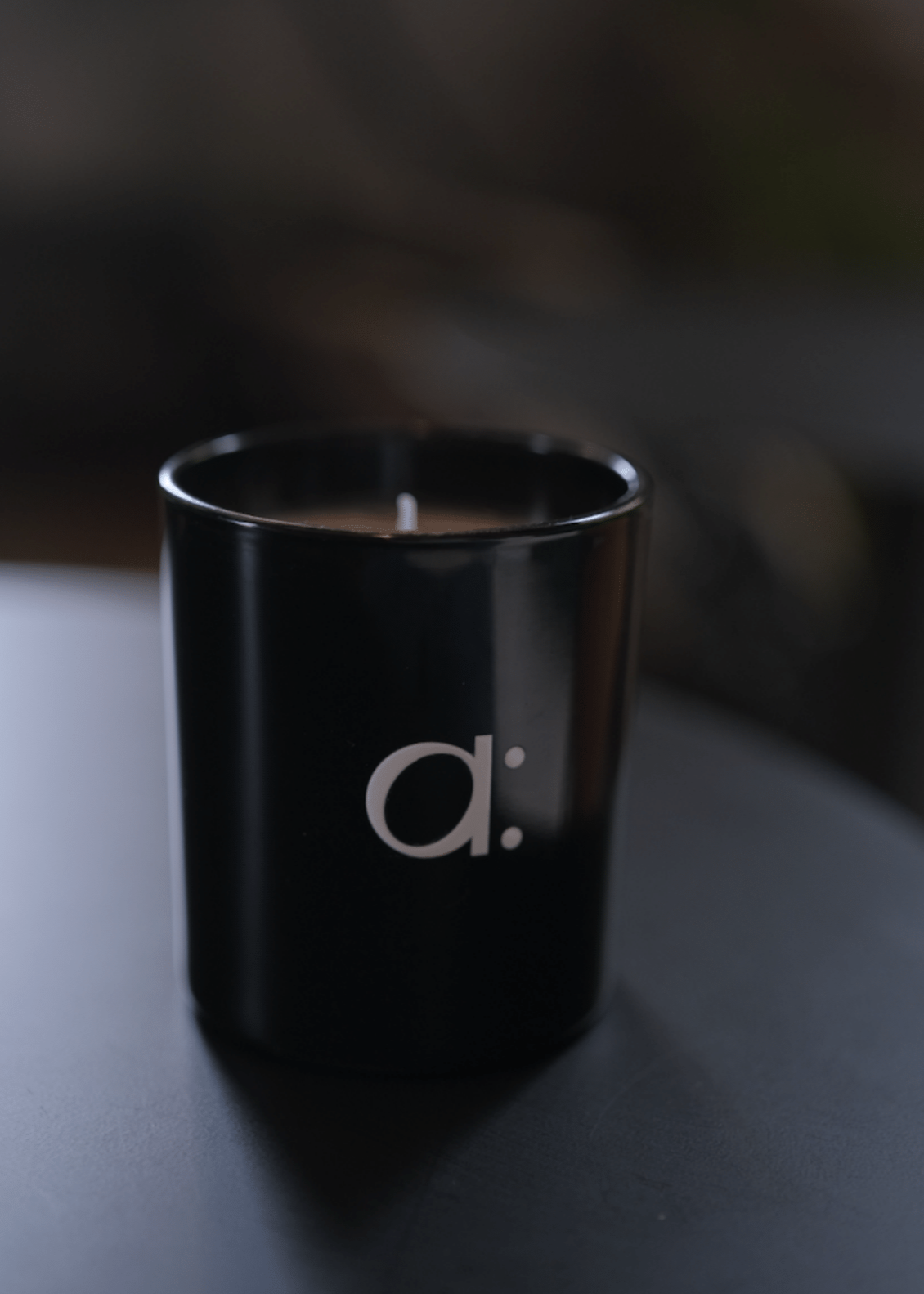 a: Black Opium Scented Candle