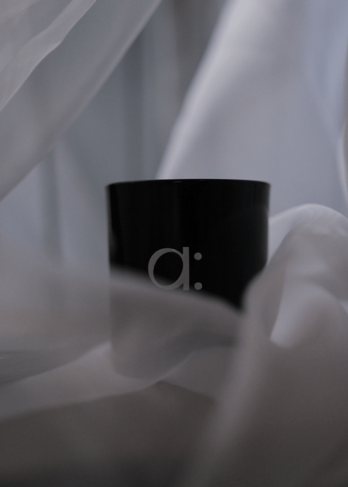 a: Sandalwood Scented Candle